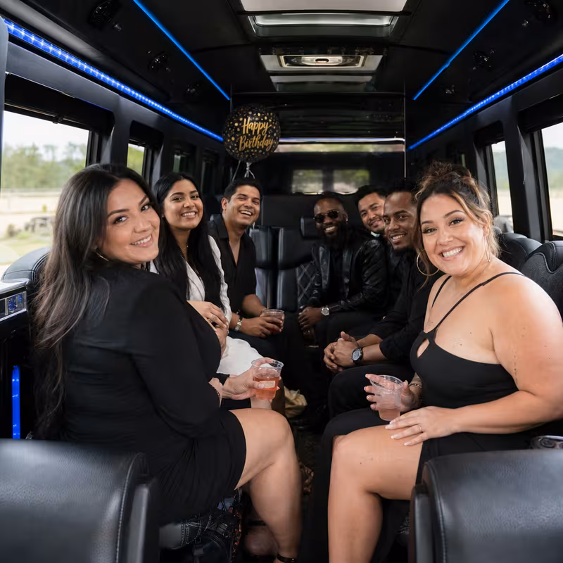 Black Mercedes Sprinter van staged for an Birmingham Birthday Transportation group